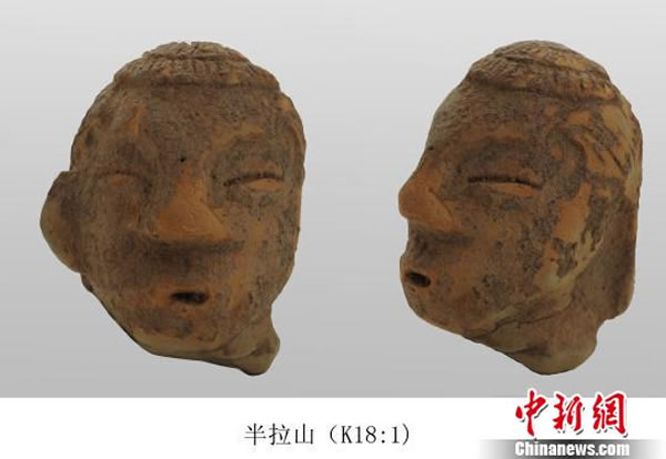 朝阳市半拉山红山文化积石冢首次发掘出土5000年前陶人头像和石人头像