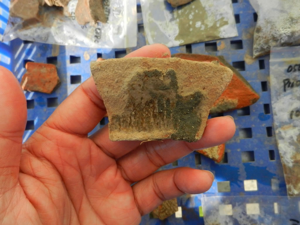 苗栗店子窝出土文物:绳纹陶。图片来源:庶古文创。