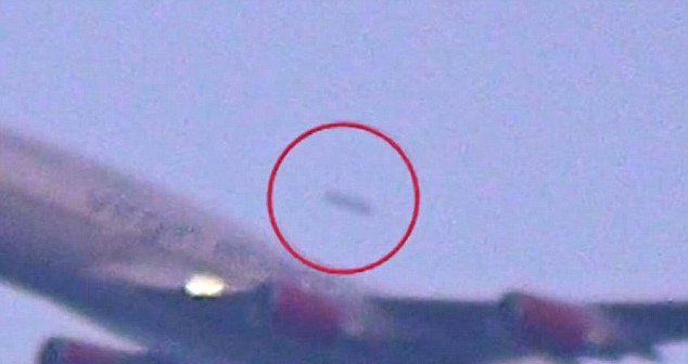 专家暂亦无法证实该黑点(红圈)究竟所属何物