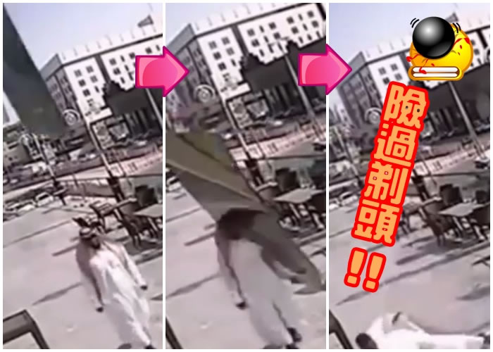 玻璃窗突然从天而降,贴边擦过男子的头,再掉在地上。