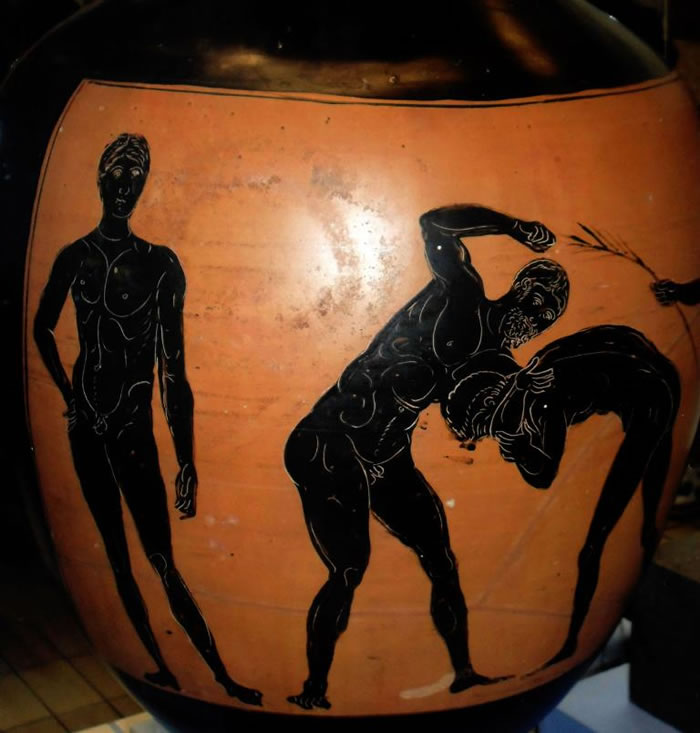 两位pankration选手;这是结合拳击与摔角的自由搏斗,只差不能咬人或刺人。 PHOTOGRAPH BY WORLD HISTORY ARCHIVE, AL