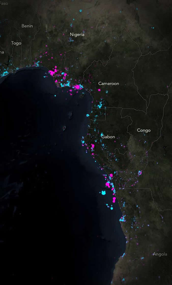 西非沿海的蓝色和粉红色光点,可能代表离岸钻油的变化,蓝点表示新的钻油地点。 MAP BY JOHN NELSON