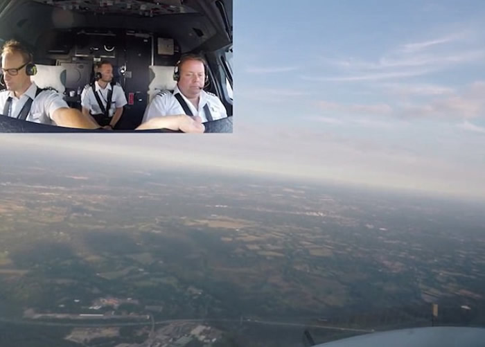 飞机升空后,机组人员可以从驾驶舱看到伦敦郊区的田园景色。