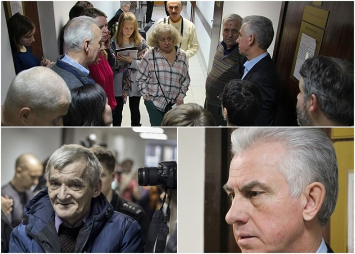 阿努夫里耶夫 (上图右二、右下图)与德来特里耶夫的支持者对话。