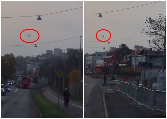 纳粹德国秘密武器“纳粹钟”?瑞典哥德堡网友汽车中拍摄到天空中巨大吊钟型UFO飘浮