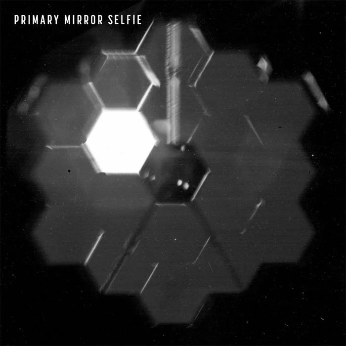 Τ��ͨ�� NIRCam �ϵ�һ�����⾵ͷ�����������