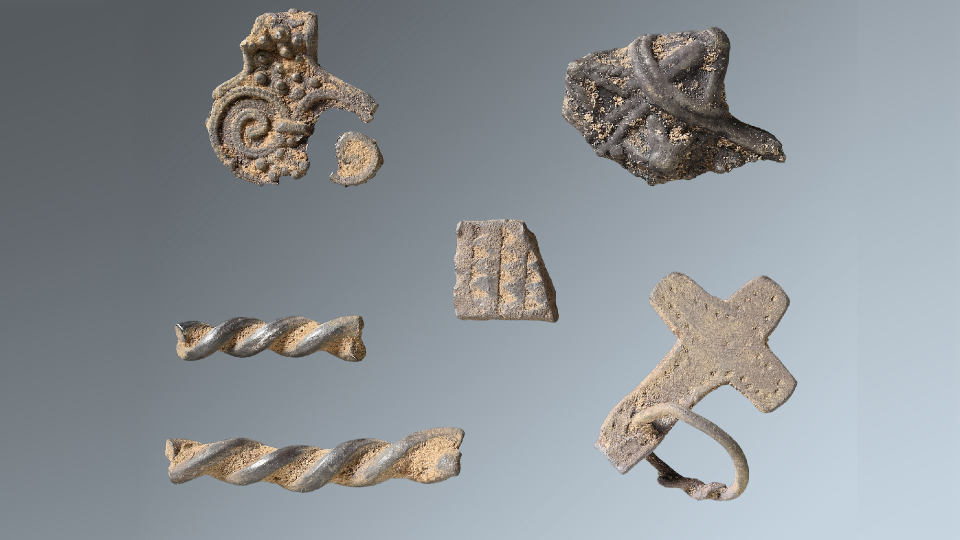 有1000年历史的维京时代宝藏有一个吊坠,可能是十字架或雷神的锤子